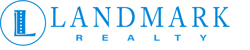 the logo for vindication realty on a blue background